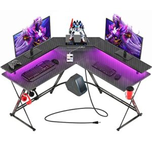 SEVEN WARRIOR Gaming Desk 50.4” with LED Lights & Power Outlets, L-Shaped Gaming Desk Carbon Fiber Surface with Monitor Stand, Ergonomic Gamer Table with Cup Holder, Headphone Hook, Black